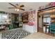 Spacious living room with a view into dining area and kitchen at 1300 63Rd N Ave, St Petersburg, FL 33702