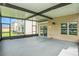 Covered screened patio with concrete flooring, offering an outdoor space at 3508 Diamond Leaf Ct, Valrico, FL 33594