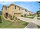 Two-story house with driveway, landscaping and a white fence at 3508 Diamond Leaf Ct, Valrico, FL 33594