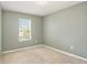 Bedroom with window, ceiling fan and neutral walls at 3508 Diamond Leaf Ct, Valrico, FL 33594