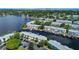 Aerial view of waterfront community with boat slips and lush landscaping at 5144 Salmon Se Dr # A, St Petersburg, FL 33705