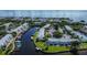 Aerial view of waterfront community with lush landscaping at 5144 Salmon Se Dr # A, St Petersburg, FL 33705
