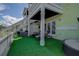 Private backyard with artificial turf and hot tub at 5144 Salmon Se Dr # A, St Petersburg, FL 33705