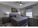 Spacious bedroom with ceiling fan, large closet, and dresser at 5144 Salmon Se Dr # A, St Petersburg, FL 33705