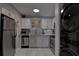Updated kitchen featuring stainless steel appliances and wood cabinets at 5144 Salmon Se Dr # A, St Petersburg, FL 33705