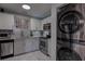 Modern kitchen with stainless steel appliances and granite countertops at 5144 Salmon Se Dr # A, St Petersburg, FL 33705
