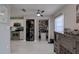 Convenient laundry room with stackable washer and dryer, and adjacent pantry at 5144 Salmon Se Dr # A, St Petersburg, FL 33705