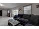 Comfortable living room with large windows and patio access at 5144 Salmon Se Dr # A, St Petersburg, FL 33705