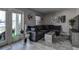 Modern living room with comfortable sectional sofa and access to a patio at 5144 Salmon Se Dr # A, St Petersburg, FL 33705