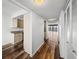 Hallway with a view into the kitchen and living area, showcasing the condo's open floor plan at 7100 Sunset Way # 405, St Pete Beach, FL 33706