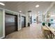 Building lobby with elevators and seating area at 7100 Sunset Way # 405, St Pete Beach, FL 33706