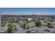 An aerial view of a parking lot and surrounding buildings at 7100 Sunset Way # 405, St Pete Beach, FL 33706