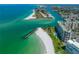 Aerial view showcasing beachfront property and surrounding area at 7100 Sunset Way # 405, St Pete Beach, FL 33706
