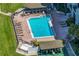 Relaxing resort pool with plenty of lounge chairs at 7100 Sunset Way # 405, St Pete Beach, FL 33706