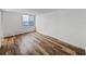 Bedroom with ocean view and wood-look floors at 7100 Sunset Way # 405, St Pete Beach, FL 33706