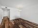 Hardwood floor hallway with access to other rooms at 7100 Sunset Way # 405, St Pete Beach, FL 33706