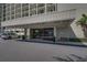 Ednoy Pointe West building entrance with covered parking at 7100 Sunset Way # 405, St Pete Beach, FL 33706