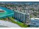 Aerial view of beachfront resort community and surrounding area at 7100 Sunset Way # 405, St Pete Beach, FL 33706