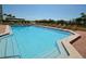 Inviting community pool with ample lounge space at 7100 Sunset Way # 405, St Pete Beach, FL 33706