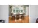 Bright dining room featuring a wooden table and four chairs at 2507 Lancaster Dr, Sun City Center, FL 33573