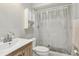 Clean bathroom with a shower/tub combo and a modern vanity at 2507 Lancaster Dr, Sun City Center, FL 33573