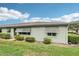 House exterior with manicured lawn and attractive landscaping at 2507 Lancaster Dr, Sun City Center, FL 33573