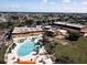 Aerial view of clubhouse, pool, and bocce ball court at 2507 Lancaster Dr, Sun City Center, FL 33573