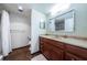 Bathroom with vanity, shower, and tiled floors at 7037 Sunset S Dr # 602, South Pasadena, FL 33707
