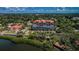 Aerial view showing building location near waterfront and park at 7037 Sunset S Dr # 602, South Pasadena, FL 33707