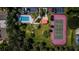 Aerial view of community pool and tennis court at 7037 Sunset S Dr # 602, South Pasadena, FL 33707
