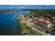 Aerial view of waterfront community with lush landscaping and bay access at 7037 Sunset S Dr # 602, South Pasadena, FL 33707