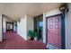 Building hallway with access to condo unit at 7037 Sunset S Dr # 602, South Pasadena, FL 33707