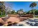 Community patio deck with seating for residents to relax and socialize at 7037 Sunset S Dr # 602, South Pasadena, FL 33707