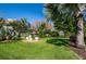 Well-maintained garden with lush greenery and decorative elements at 7037 Sunset S Dr # 602, South Pasadena, FL 33707