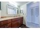 Bathroom with vanity and tiled floors, near a hallway and closet at 7037 Sunset S Dr # 602, South Pasadena, FL 33707