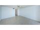 Spacious bedroom with tiled floors and ample closet space at 7037 Sunset S Dr # 602, South Pasadena, FL 33707