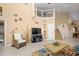 Open living area showcasing a cozy sitting area and built-in shelving at 1217 Gorda Cay Ln, Punta Gorda, FL 33950