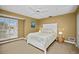 Bedroom with a queen-size bed and coastal decor at 1217 Gorda Cay Ln, Punta Gorda, FL 33950