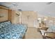 Upstairs bedroom with a view of the kitchen and living areas at 1217 Gorda Cay Ln, Punta Gorda, FL 33950
