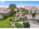 Two-story home with tile roof and attached garage at 1217 Gorda Cay Ln, Punta Gorda, FL 33950