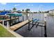 Private boat docks with lift for convenient boating at 1217 Gorda Cay Ln, Punta Gorda, FL 33950