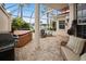 Screened patio boasts a hot tub and comfortable seating area at 1217 Gorda Cay Ln, Punta Gorda, FL 33950