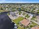 Aerial view of waterfront community showing canal and homes at 1217 Gorda Cay Ln, Punta Gorda, FL 33950