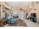 Bright and airy living room with comfortable seating and large TV at 1217 Gorda Cay Ln, Punta Gorda, FL 33950