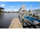 Private concrete boat lift with electric connection and canal access at 1217 Gorda Cay Ln, Punta Gorda, FL 33950