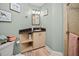 Bathroom with corner sink, storage, and shower at 1217 Gorda Cay Ln, Punta Gorda, FL 33950