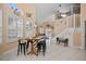 Casual dining area with rustic table and chairs near the kitchen at 1217 Gorda Cay Ln, Punta Gorda, FL 33950