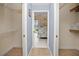 Large walk-in closet with shelving and access to a bedroom at 1217 Gorda Cay Ln, Punta Gorda, FL 33950