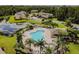 Community pool with surrounding lounge area at 20461 Berrywood Ln, Tampa, FL 33647
