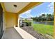 Back patio with pond and community views at 20461 Berrywood Ln, Tampa, FL 33647
